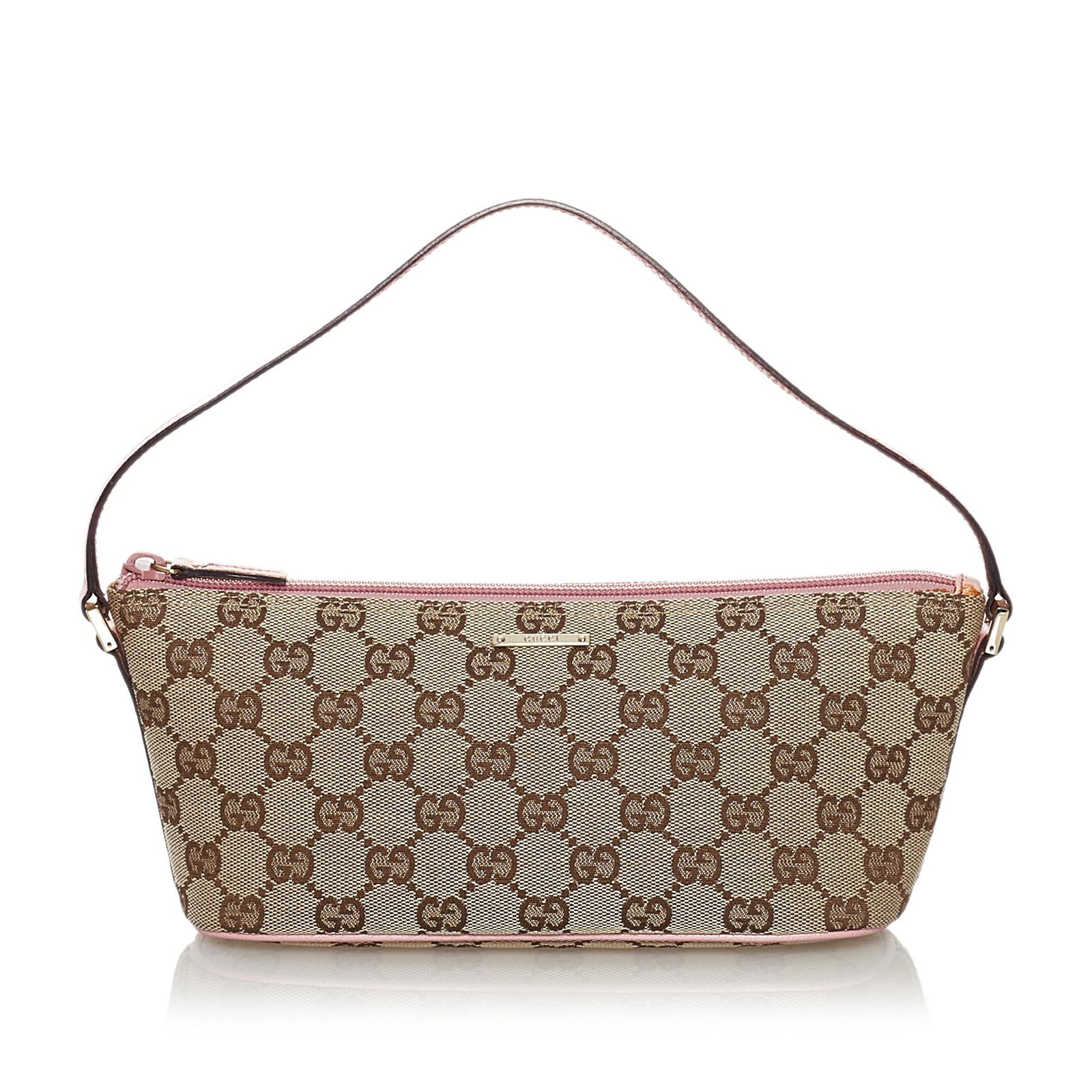 Gucci GG Canvas Boat Baguette: Gucci GG Canvas Boat Baguette This baguette features a canvas body with leather trim a flat leather strap and a top zip closure. Brand: Gucci Model: GG Canvas Boat Baguette Origin: Italy Category: Bag