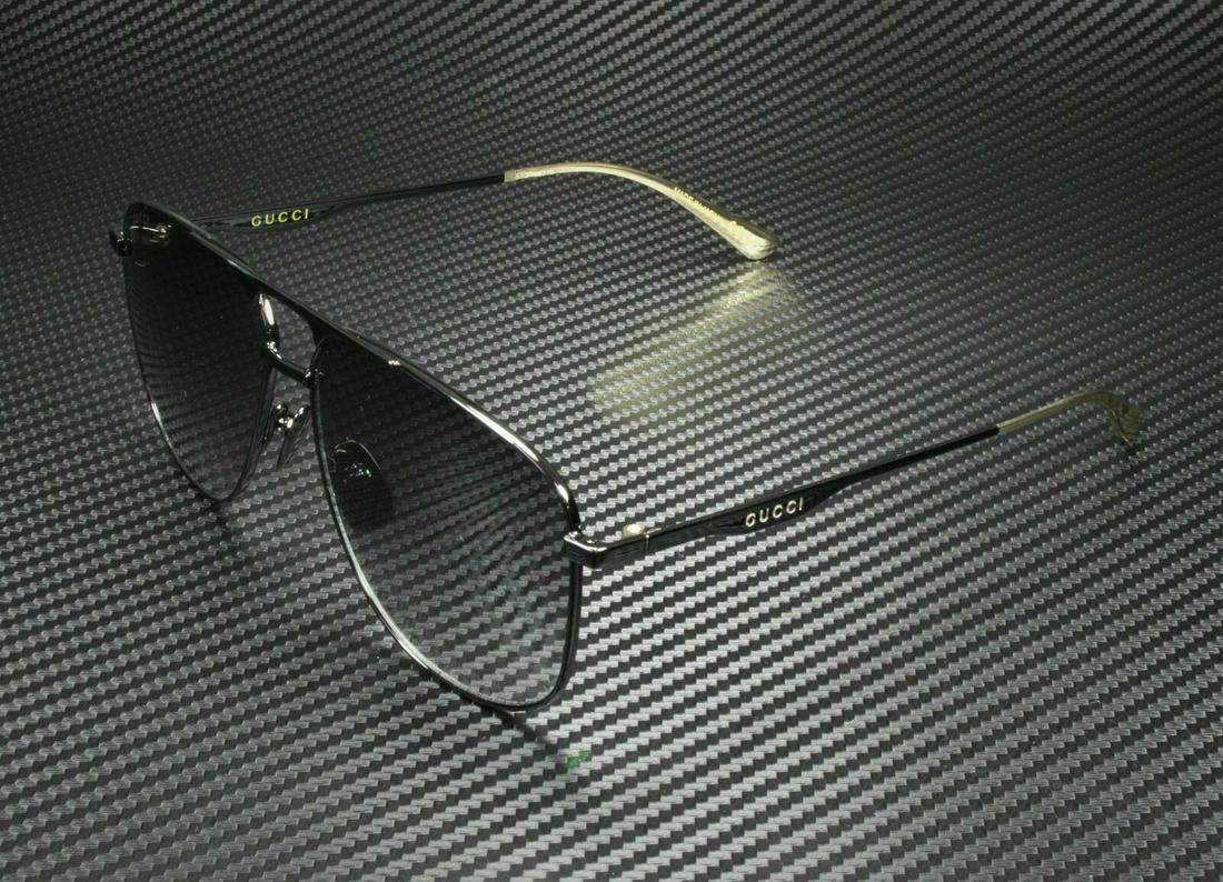 GUCCI GG0336S 002 Black Rectangle Men's Sunglasses 60 mm: GUCCI GG0336S 002 Black Rectangle Men's Sunglasses 60 mm Pattern: Solid Lens Technology: Gradient Brand: Gucci Frame Color: Black Uv Protection: UV400 Type: Sunglasses Lens Material: Polycarbonate Mod