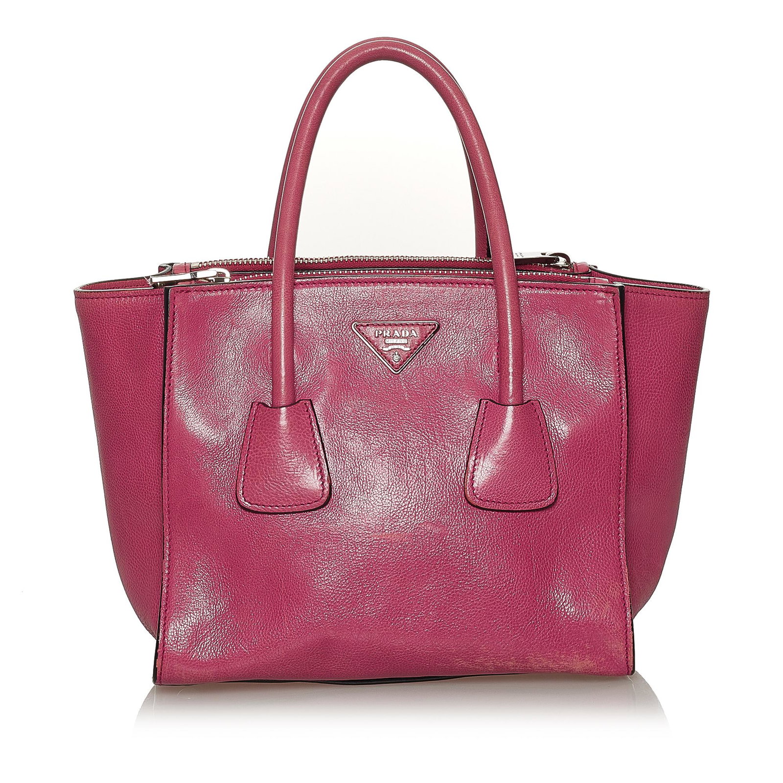 Prada Twin Pocket Leather Satchel: Prada Twin Pocket Leather Satchel The Twin Pocket satchel features a calf leather body rolled leather handles a detachable flat leather strap an open top with a magnetic closure interior top zip compa