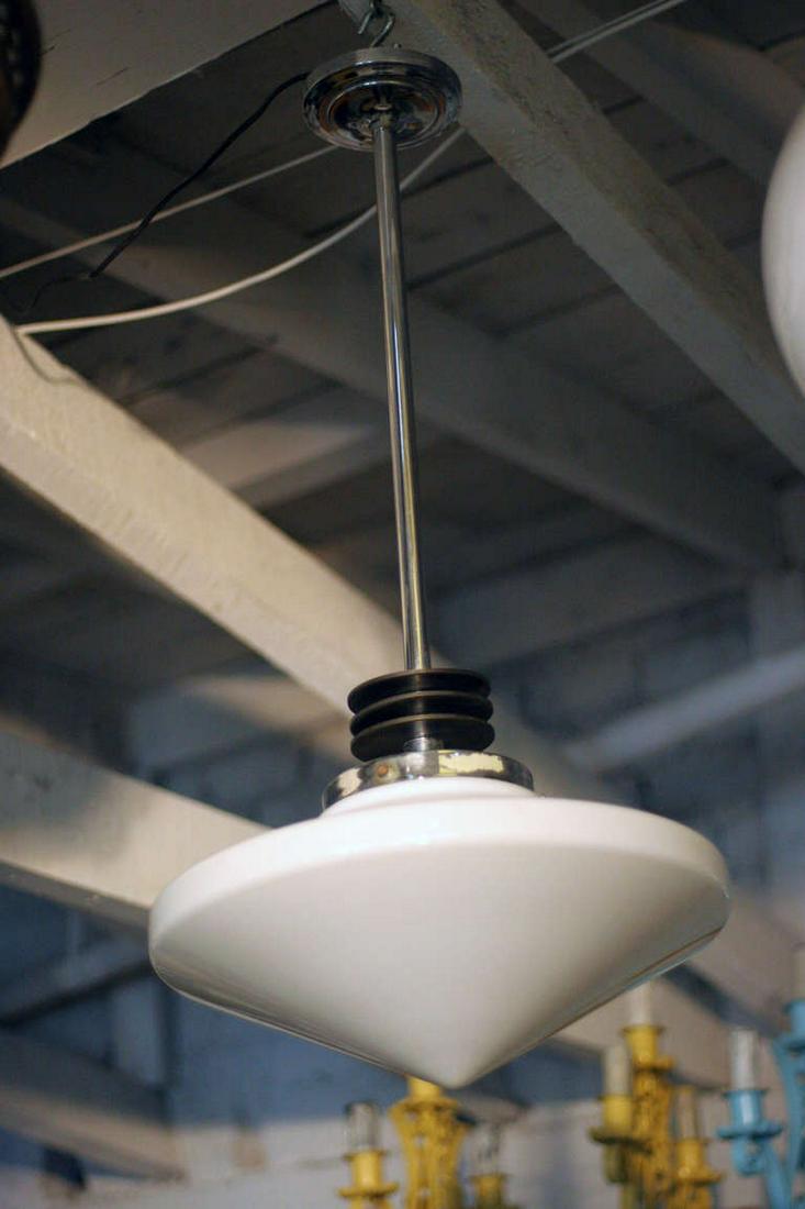 Streamline Ceiling Pendant with Glass Globe Pendant circa 1930: Streamline Ceiling Pendant with Glass Globe Pendant circa 1930 Dimensions: Height: 36 in. (91.44 cm) Dimensions: Diameter: 15 in. (38.1 cm) Style: Art Deco (Of the Period) Materials and Techniques: Ch