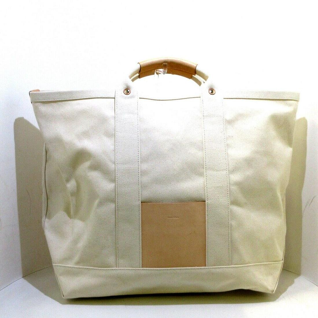 Hender Scheme Cream Beige Canvas Leather Tote Bag: Hender Scheme Cream Beige Canvas Leather Tote Bag Brand: Hender Scheme Style: Tote Bag Exterior Color: Cream Beige Exterior Material: Canvas Leather Model Number: mj-rb-cbb Accessories: Shoulder Strap