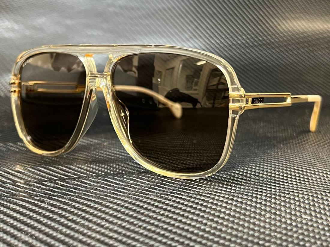 GUCCI GG1105S 004 Yellow Aviator 63 mm Men's Sunglasses: GUCCI GG1105S 004 Yellow Aviator 63 mm Men's Sunglasses Brand: Gucci Frame Color: Yellow Style: Aviator Type: Sunglasses New The BIDHAUS Guarantee: All items in this auction are guaranteed to be 100%