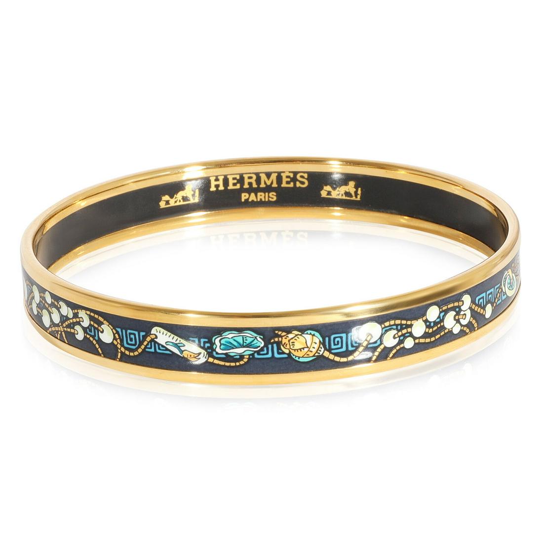 Hermes Narrow Enamel Bracelet with Bead Necklace Design: Hermes Narrow Enamel Bracelet with Bead Necklace Design Item Length: 8 in Original Box?: No Original Papers?: No Gross Weight (Grams): 22.43 Type: Bracelet Style: Bracelet Stone Creation: Natural Meta