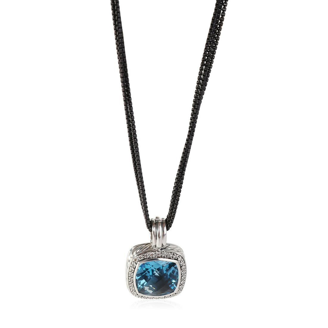 David Yurman Albion Topaz Diamond Pendant in Sterling Silver 0.24 CTW: David Yurman Albion Topaz Diamond Pendant in Sterling Silver 0.24 CTW Side Stone Shape: Round Brilliant Item Length: 16 in Side Stone Type: Diamond Side Stone Weight (Cts): 0.24 Main Stone: Topaz Side