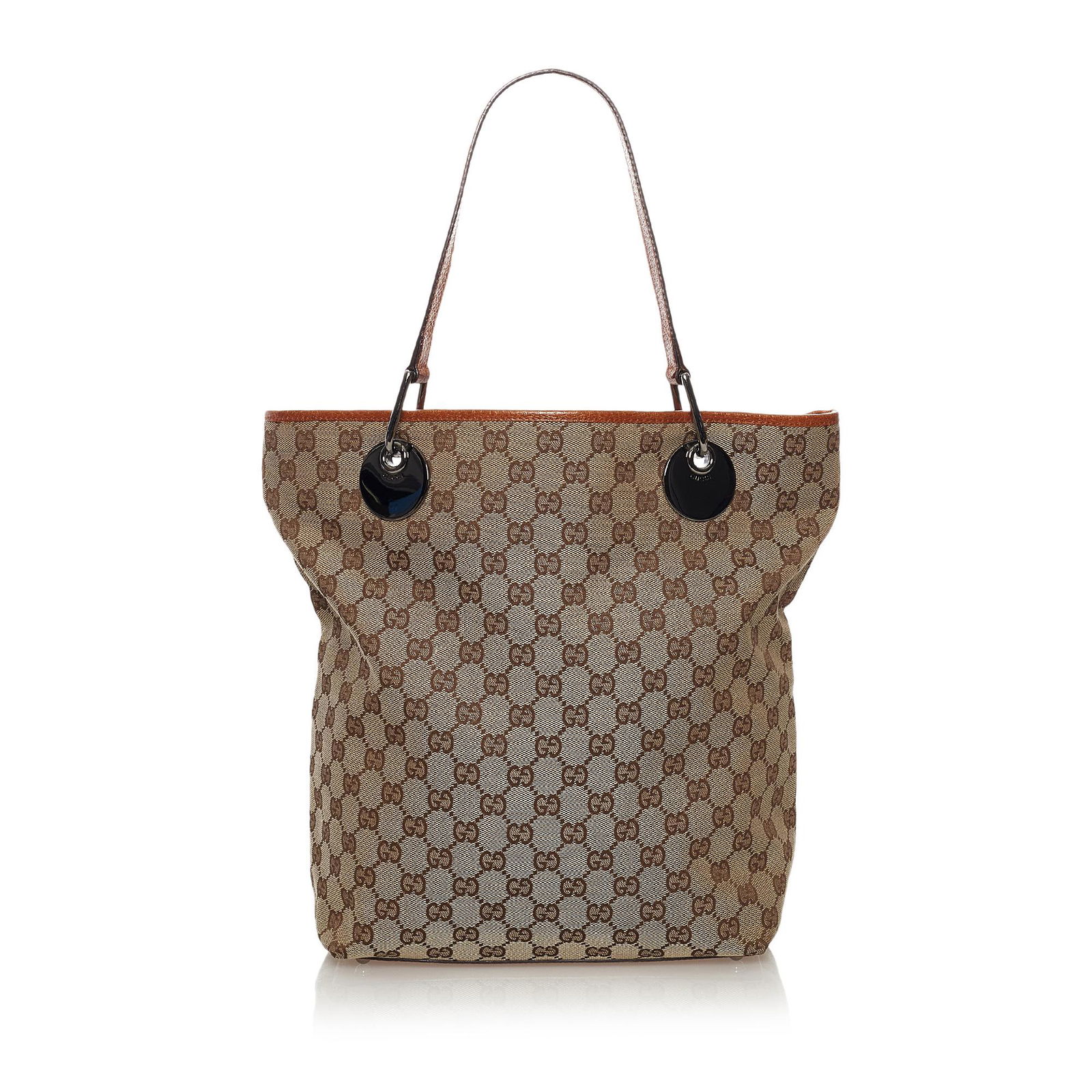 Gucci GG Canvas Eclipse Tote Bag: Gucci GG Canvas Eclipse Tote Bag The Eclipse tote bag features a canvas body with leather trim flat leather straps an open top an interior zip compartment and an interior zip pocket. Brand: Gucci Mode