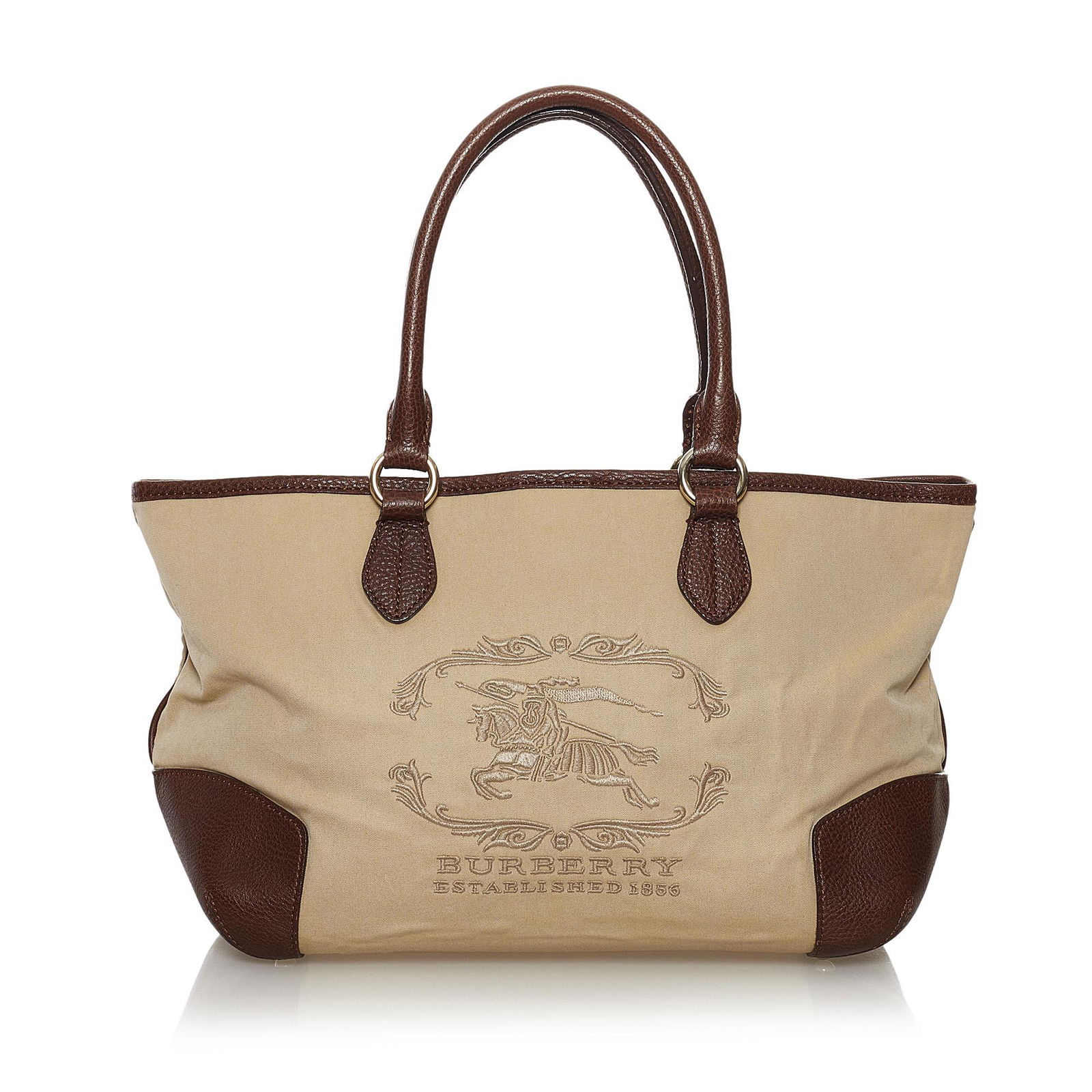 Burberry Nylon Tote Bag: Burberry Nylon Tote Bag This tote bag features a nylon body with leather trim flat leather straps an open top and interior zip and slip pockets. Brand: Burberry Model: Nylon Tote Bag Origin: United Ki