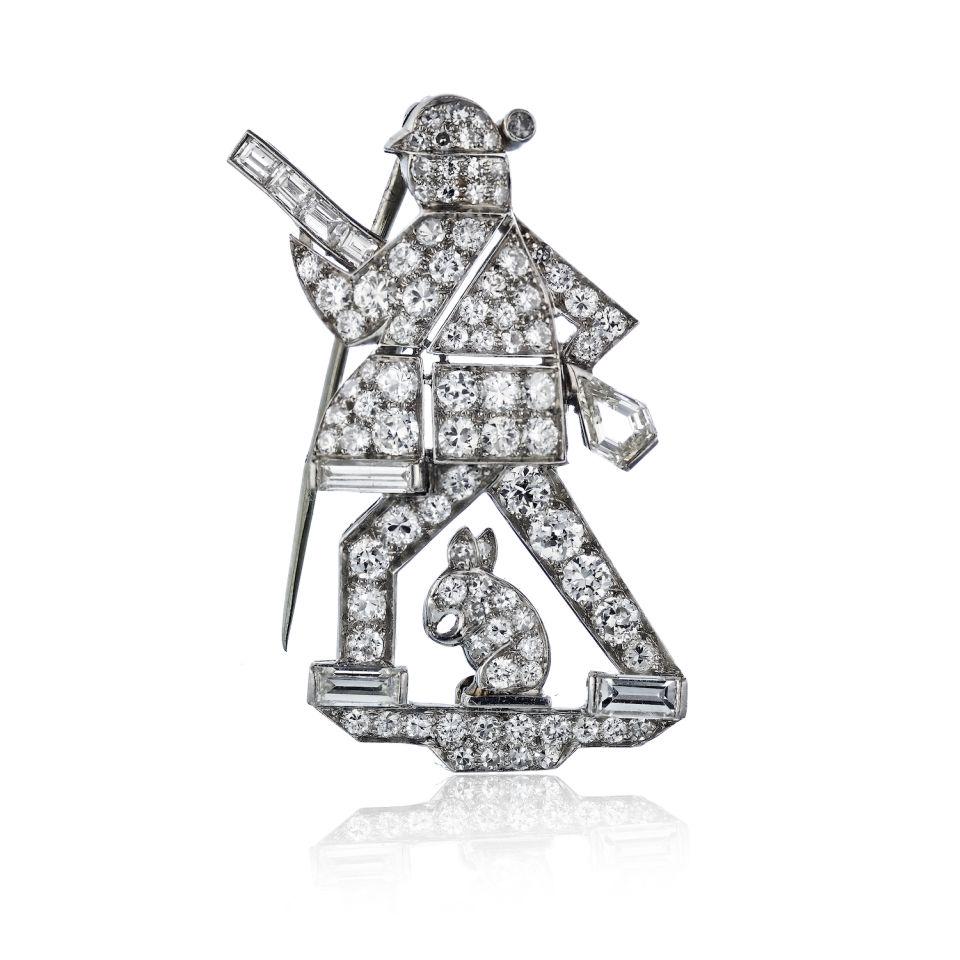 Art Deco Platinum Diamond Hunter Brooch: Art Deco Platinum Diamond Hunter Brooch Type: Brooches Metal: Platinum Grams: 12.1 Approximate Diamond Weight: 5.5 Cts Measurements: L: 40mm Condition: Excellent. Style: Art Deco Other Details: Art De