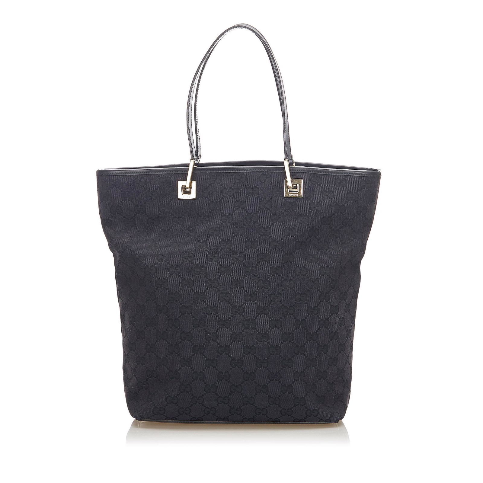 Gucci GG Canvas Tote Bag: Gucci GG Canvas Tote Bag The GG tote bag features a canvas body a flat leather straps an open top and an interior zip pocket. Brand: Gucci Model: GG Canvas Tote Bag Origin: ITALY Category: Bags Color: