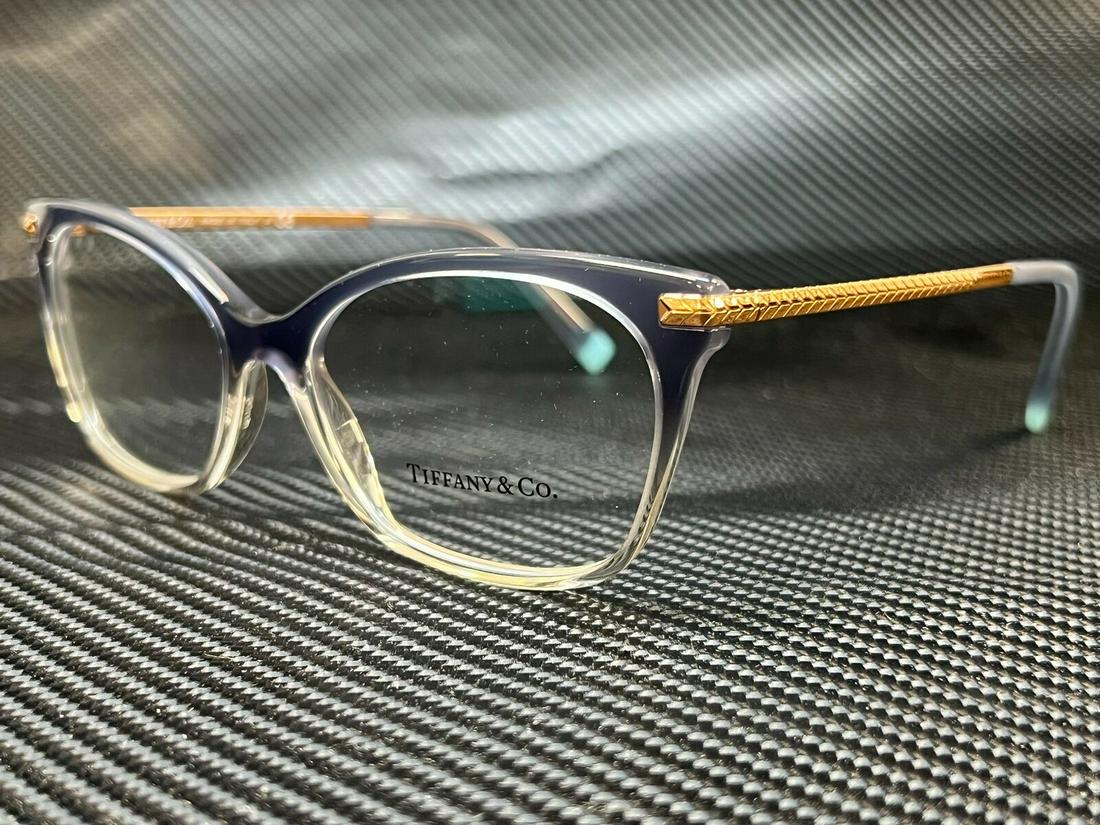 Tiffany TF2194 8298 Grey Blue Gradient Demo Lens Women's Eyeglasses 54 mm: Tiffany TF2194 8298 Grey Blue Gradient Demo Lens Women's Eyeglasses 54 mm Brand: Tiffany & Co. Frame Color: Gray Type: Eyeglasses Lens Socket Width: 54 mm Bridge Width: 16 mm Temple Length: 140 mm New