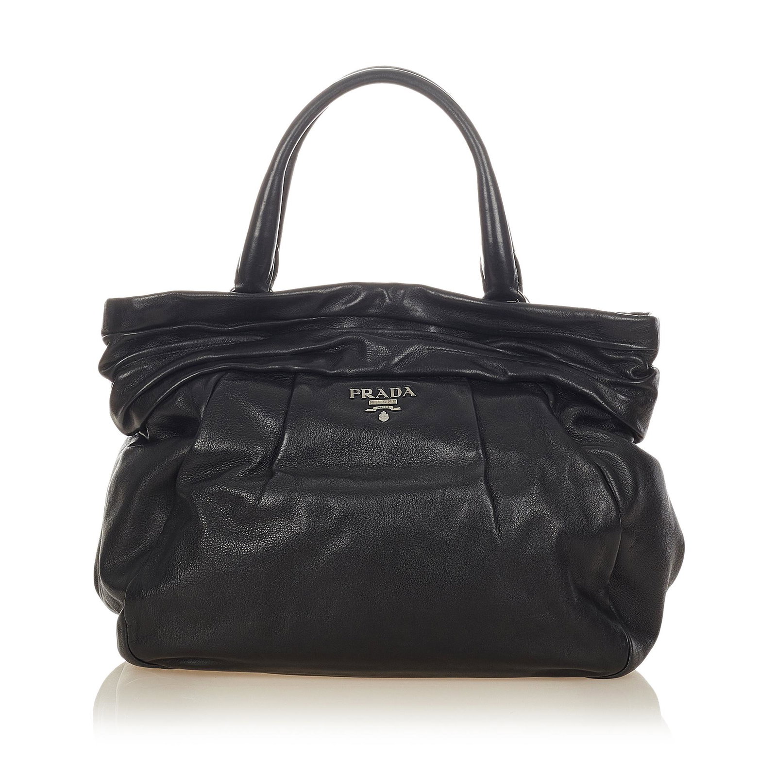 Prada Leather Handbag: Prada Leather Handbag This handbag features a leather body rolled leather handles top zip closure and an interior slip pockets. Brand: Prada Model: Leather Handbag Origin: Italy Category: Bags Color: 