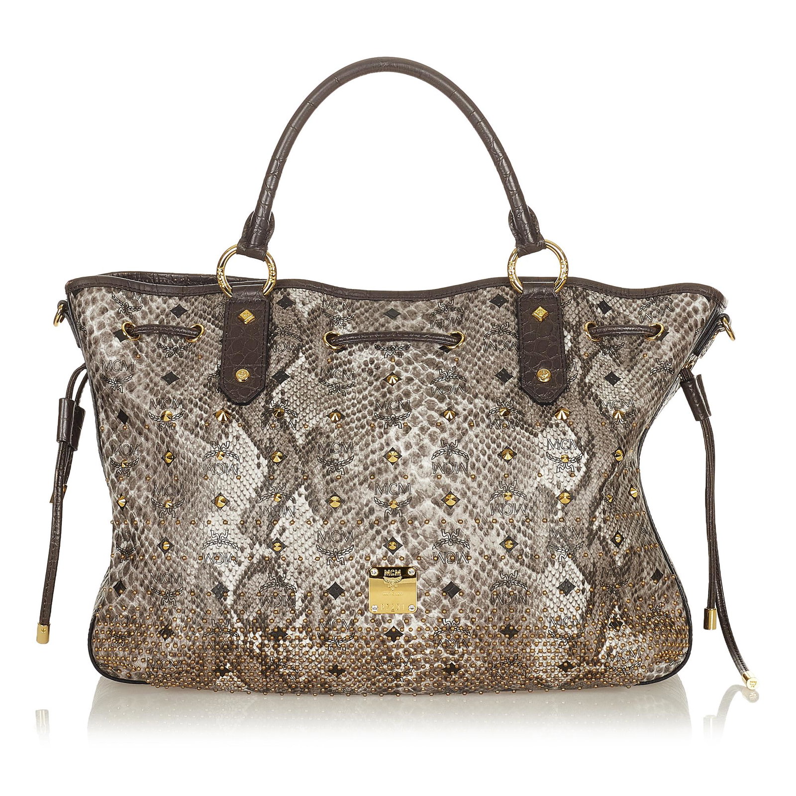 MCM Visetos Printed Leather Tote Bag: MCM Visetos Printed Leather Tote Bag This tote bag features a printed leather body rolled leather straps an open top and interior zip and slip pockets. Brand: MCM Model: Visetos Printed Leather Tote B