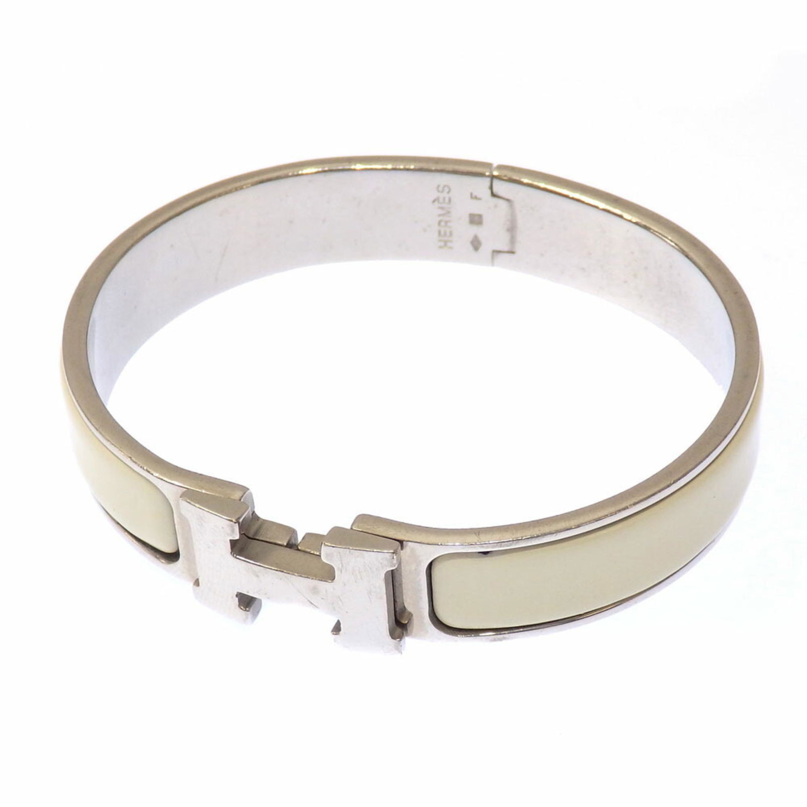 Hermes Bracelet Click Crack PM Ladies Enamel White Silver Bangle: Hermes Bracelet Click Crack PM Ladies Enamel White Silver Bangle Brand: Hermes Line: Clic Material: Enamel Color: Silver White Length: 16cm / 6.29 Width: 1.15cm / 0.45 Condition: Used (good) Overall S