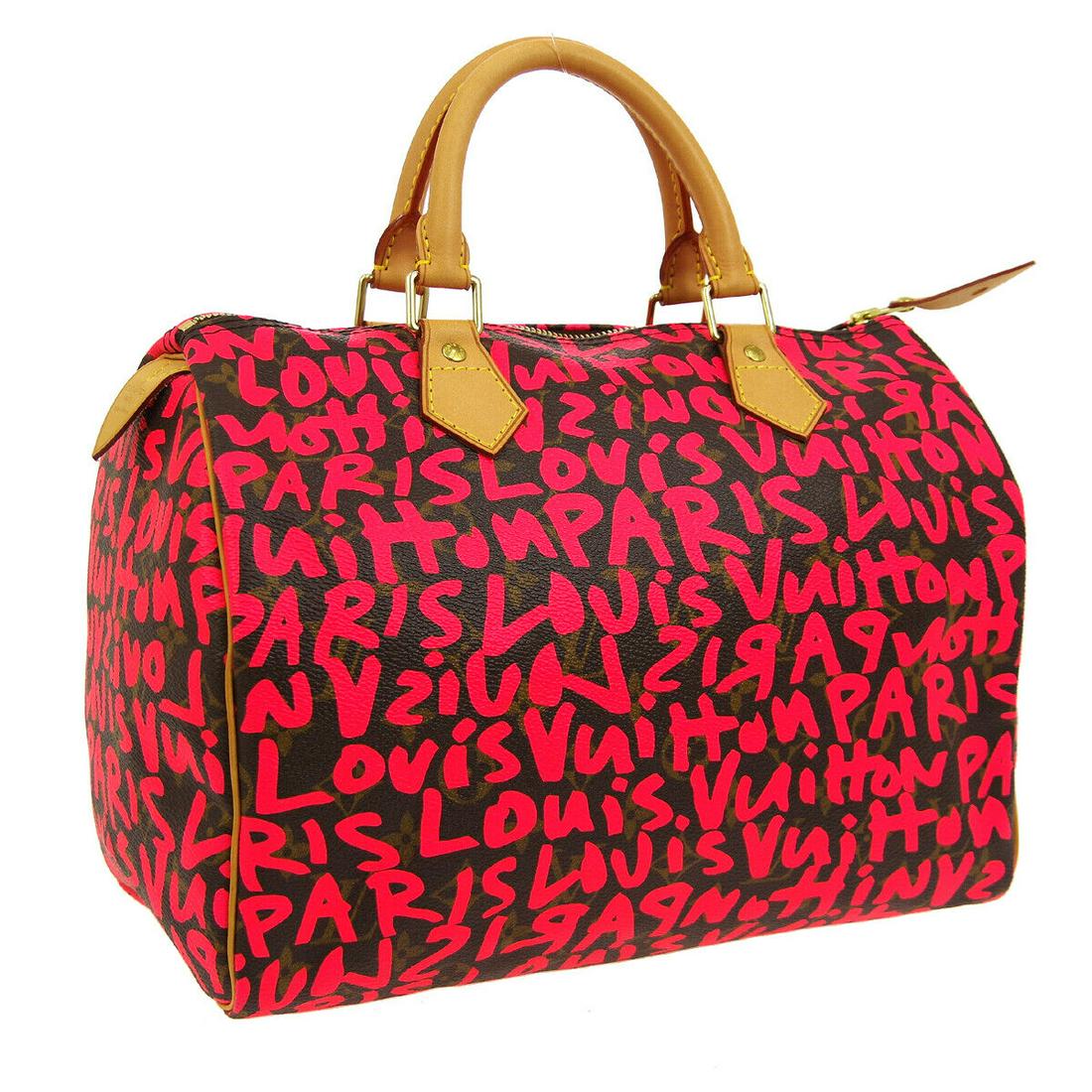 LOUIS VUITTON SPEEDY 30 HAND BAG AA0039 MONOGRAM GRAFFITI M93704: LOUIS VUITTON SPEEDY 30 HAND BAG AA0039 MONOGRAM GRAFFITI M93704 Size: Medium Style: Hand Bag Bag Height: 8.5 Exterior Material: Monogram Graffiti Canvas Leather Exterior Color: Brown Pink Closure: Zi