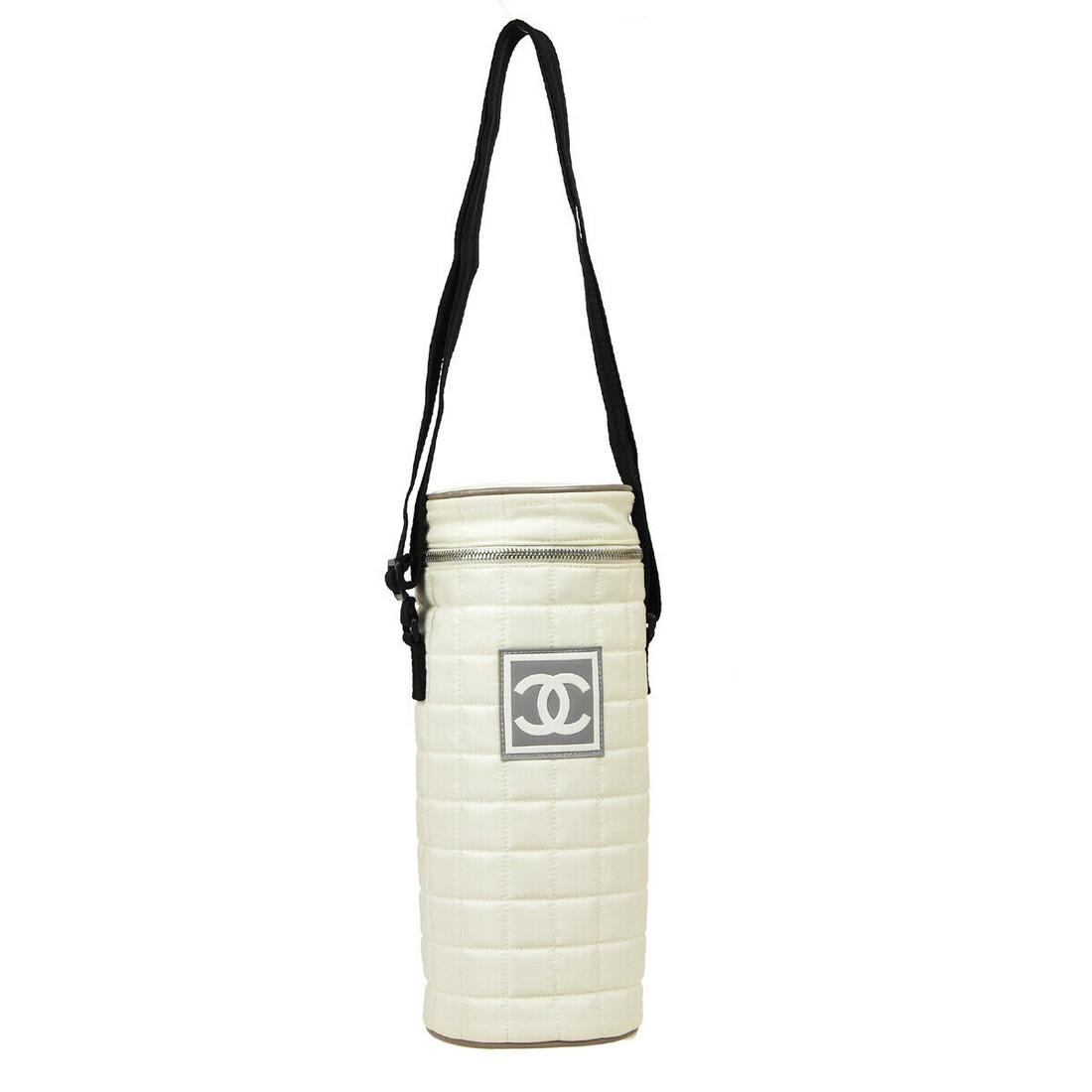 CHANEL Choco Bar Sport Line Bottle Case Pochette 6423990 White Nylon: CHANEL Choco Bar Sport Line Bottle Case Pochette 6423990 White Nylon Size: Medium Accents: Logo Model: Bottle Case Style: Shoulder Pochette Handle Style: Crossbody Strap Bag Height: 11.4 Product Line: