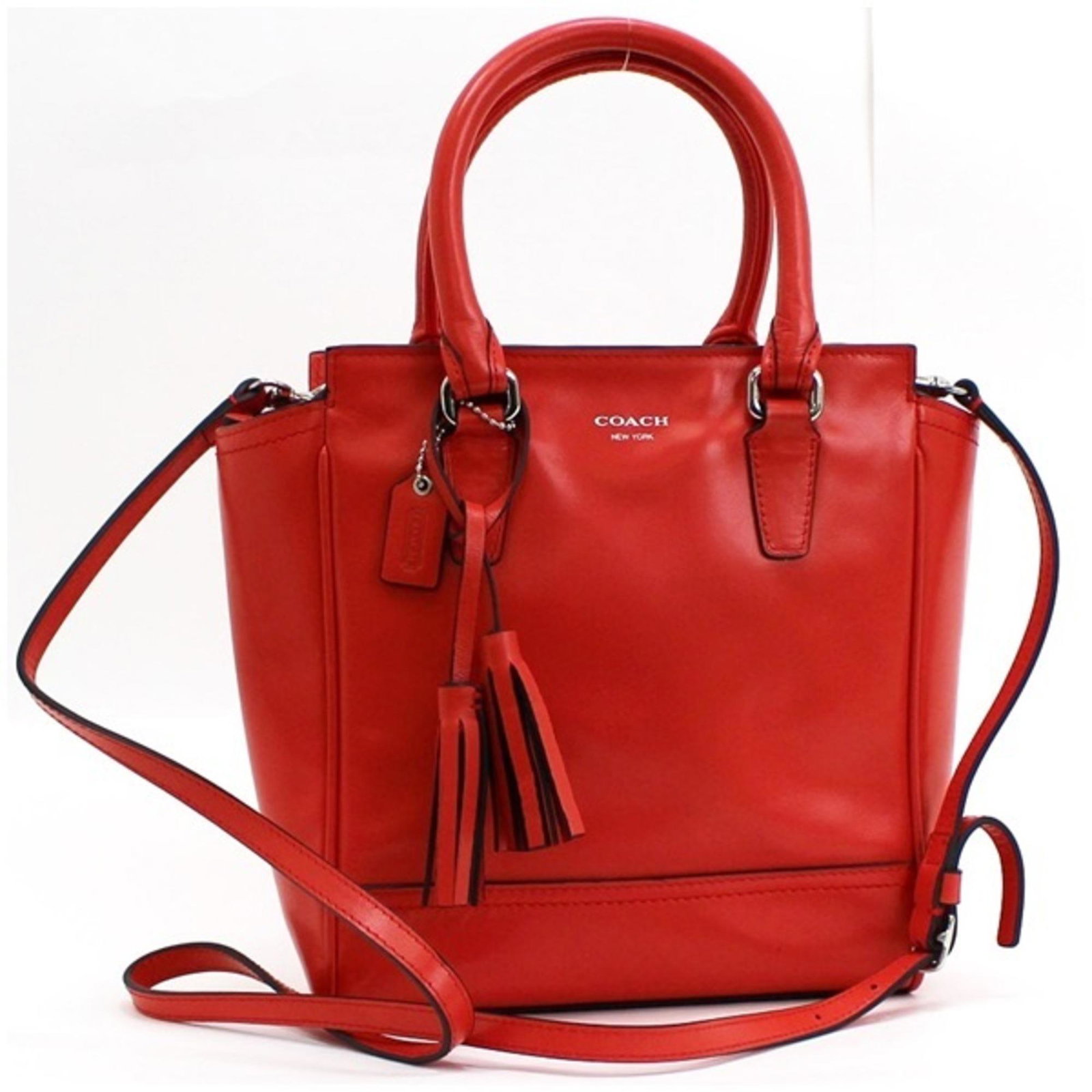 Coach Legacy Mini Tanner Handbag Shoulder Bag Leather Red COACH Ladies Tassel: Coach Legacy Mini Tanner Handbag Shoulder Bag Leather Red COACH Ladies Tassel Brand: Coach Line: Legacy Type: Handbag Shoulder bag Material: Leather Leather: Color: Red color Closure: Zipper Gender: M