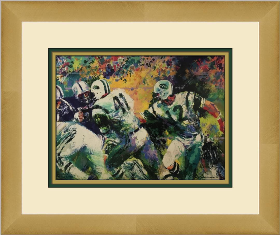 Leroy Neiman The Handoff Custom Framed Print: Leroy Neiman The Handoff Custom Framed Print Size: Medium (up to 36in.) Region Of Origin: united states Artist: LeRoy Neiman Production Technique: Lithography Framing: Matted & Framed Style: Impressio