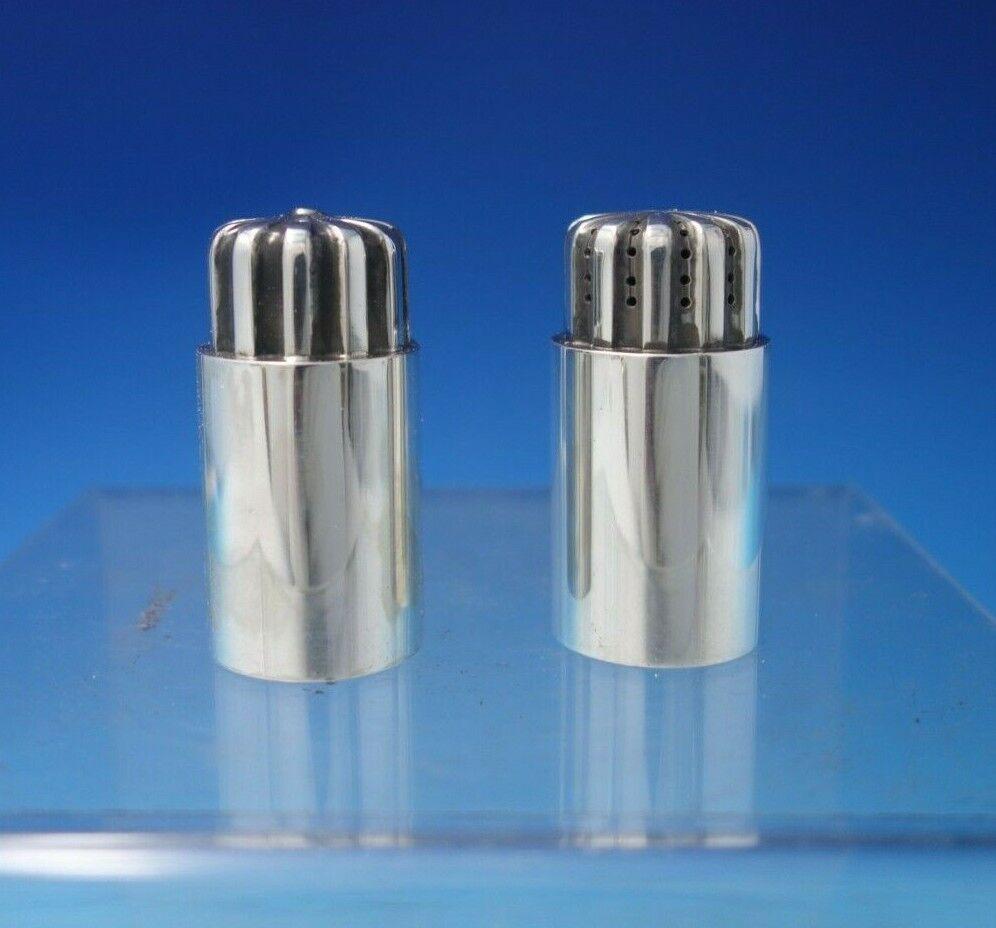 Georg Jensen Sterling Silver Salt Pepper Shaker Pair #834 1 7/8" x 1": Georg Jensen Sterling Silver Salt Pepper Shaker Pair #834 1 7/8" x 1" Composition: Sterling Silver Brand: Georg Jensen Type: Salt & Pepper Shakers Maker: Georg Jensen Georg jensenstylish georg jensen 