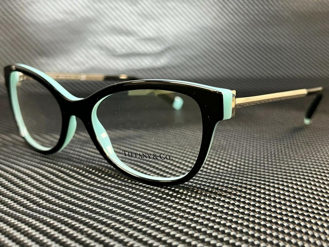 Tiffany TF2189 8274 Black Blue Women Square Demo Lens Eyeglasses Frame 54-17: Tiffany TF2189 8274 Black Blue Women Square Demo Lens Eyeglasses Frame 54-17 Brand: Tiffany & Co. Frame Color: Black Blue Type: Eyeglasses Lens Socket Width: 54 mm Bridge Width: 17 mm Temple Length: 1