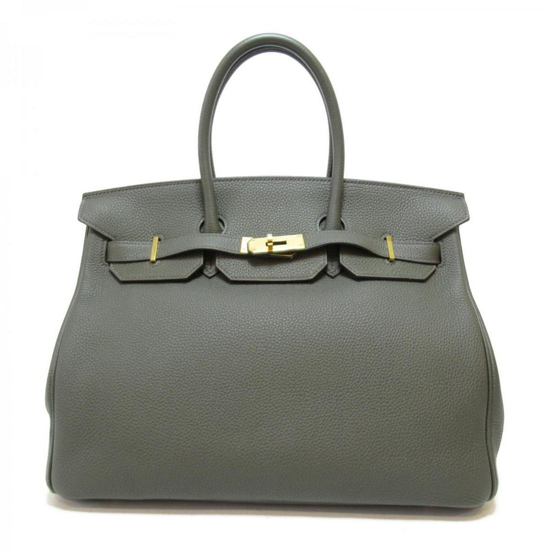 Togo Birkin 35: Togo Birkin 35 This Hermes Togo Birkin 35 Handbag features a Grey Calfskin body in size 35*27*18HAND30SERAP Drop10 for Male Brand: Hermes Model: Togo Birkin 35 Origin: France Category: Bag Color: Grey