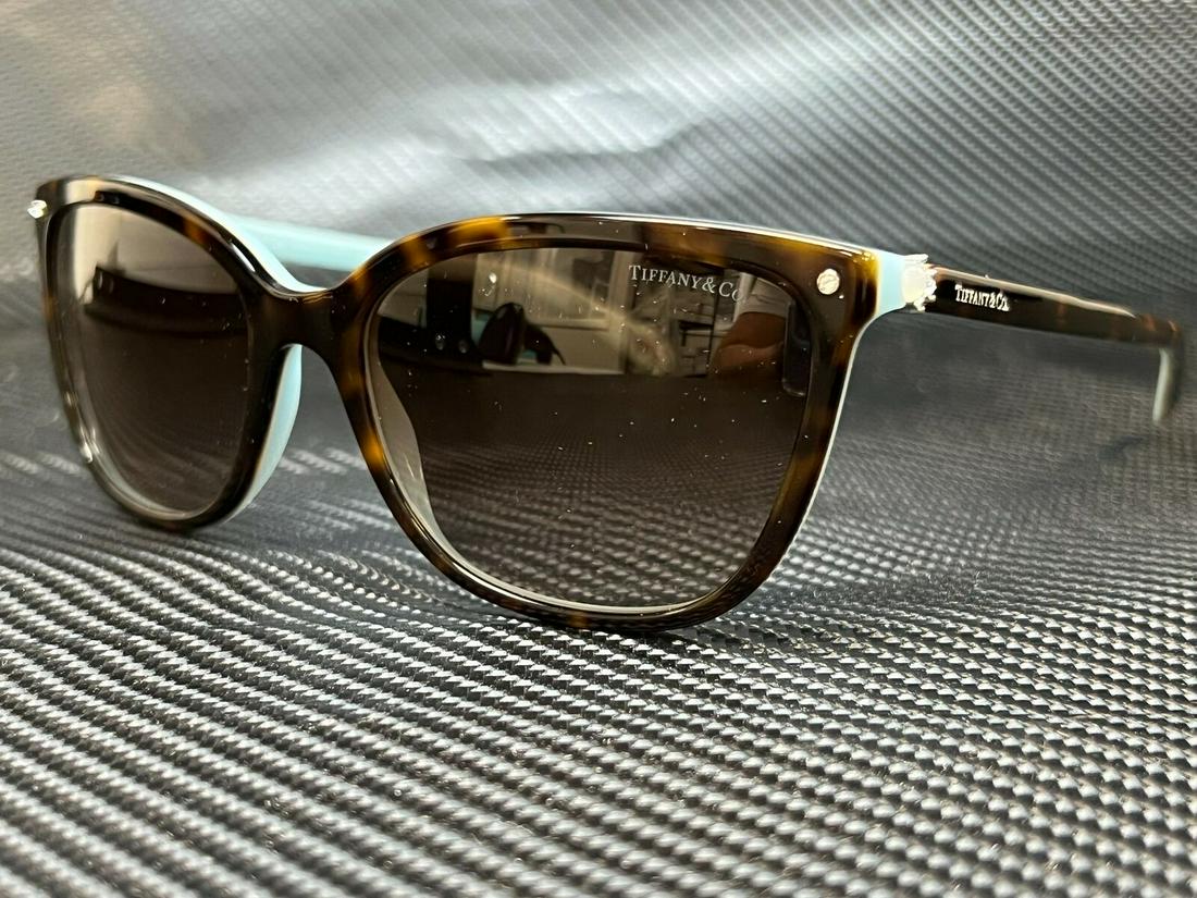 TIFFANY TF4105HB 81343B Havana Brown Gradient Women's Sunglasses 55 mm: TIFFANY TF4105HB 81343B Havana Brown Gradient Women's Sunglasses 55 mm Brand: Tiffany & Co. Type: Sunglasses Frame Color: Brown New The BIDHAUS Guarantee: All items in this auction are guaranteed to b