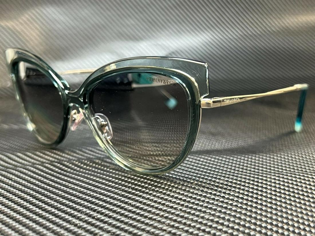 TIFFANY TF3076 83271U Light Blue Cat Eye 57 mm Women's Sunglasses: TIFFANY TF3076 83271U Light Blue Cat Eye 57 mm Women's Sunglasses Brand: Tiffany & Co. Type: Sunglasses Frame Color: Blue Style: Cat Eye New The BIDHAUS Guarantee: All items in this auction are guaran