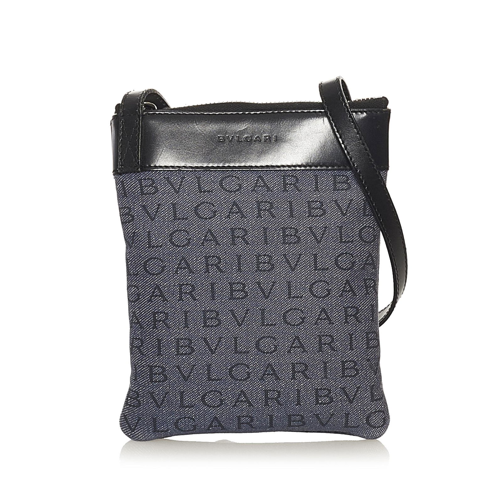Bvlgari Logomania Canvas Crossbody Bag: Bvlgari Logomania Canvas Crossbody Bag This crossbody bag features a canvas body with leather trim a flat leather strap and a top zip closure. Brand: Bvlgari Model: Logomania Canvas Crossbody Bag Orig