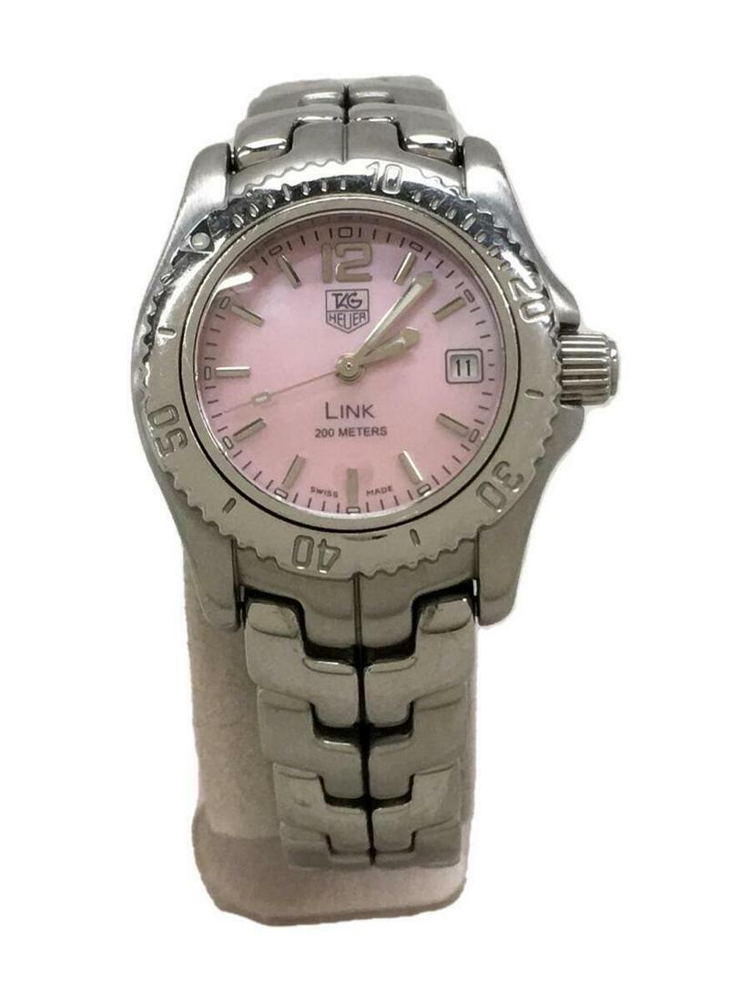 TAG Heuer WT141M Link 200m Analog Stainless Steel Pink Silver Ladies Watch: TAG Heuer WT141M Link 200m Analog Stainless Steel Pink Silver Ladies Watch Brand: Tag Heuer Type: Wristwatch Pre-Owned The BIDHAUS Guarantee: All items in this auction are guaranteed to be 100% authen