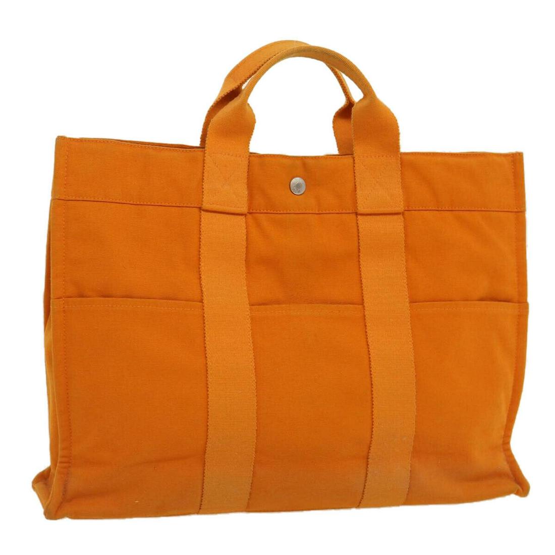HERMES Fourre ToutMM Hand Bag Canvas 2000 Honolulu Limited Orange: HERMES Fourre ToutMM Hand Bag Canvas 2000 Honolulu Limited Orange Brand: HERMES Style: Hand Bag Material: Cotton Exterior Color: Orange Bag Height: 11.4inch(Approx) / 29cm(Approx) Bag Depth: 4.3inch(A