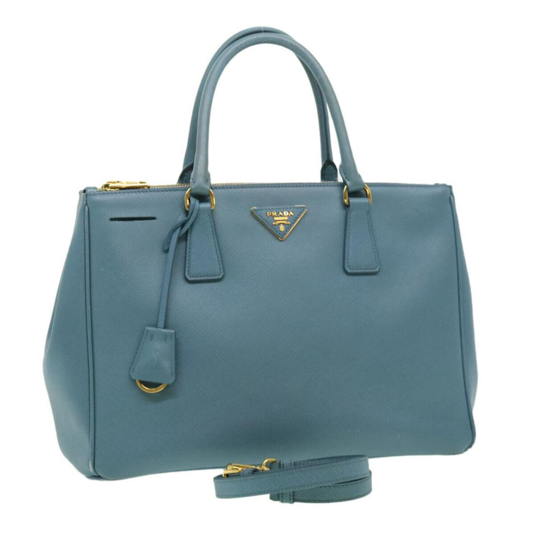 PRADA Safiano Leather Hand Bag 2way Light Blue: PRADA Safiano Leather Hand Bag 2way Light Blue Brand: PRADA Style: Hand Bag Material: Saffiano Leather Exterior Color: Light Blue Bag Height: 9.4inch(Approx) / 24cm(Approx) Bag Depth: 5.9inch(Approx) 