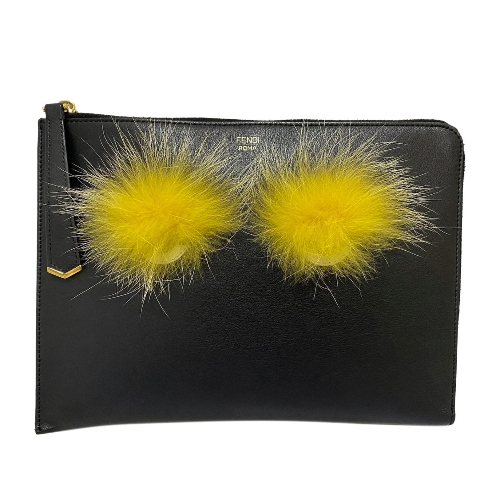 Fendi Monster Leather Clutch Bag: Fendi Monster Leather Clutch Bag The Monster clutch bag features a leather body with front fur details and a top zip closure. Brand: Fendi Model: Monster Leather Clutch Bag Origin: Italy Category: Bag