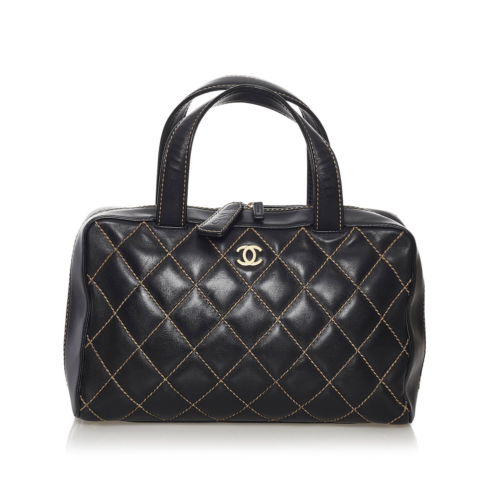 Chanel Wild Stitch Leather Handbag: Chanel Wild Stitch Leather Handbag This handbag features a quilted leather body flat leather handles a top magnetic snap closure and an interior zip pocket. Brand: Chanel Model: Wild Stitch Leather Ha