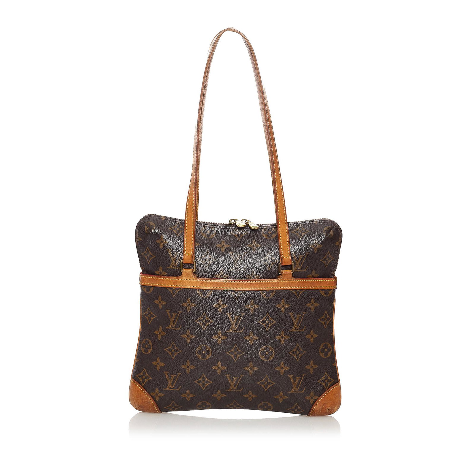 Louis Vuitton Monogram Coussin GM: Louis Vuitton Monogram Coussin GM The Coussin GM features a monogram canvas body with leather trim an exterior open pocket flat leather straps a top zip closure and an interior slip pocket. Brand: Lou