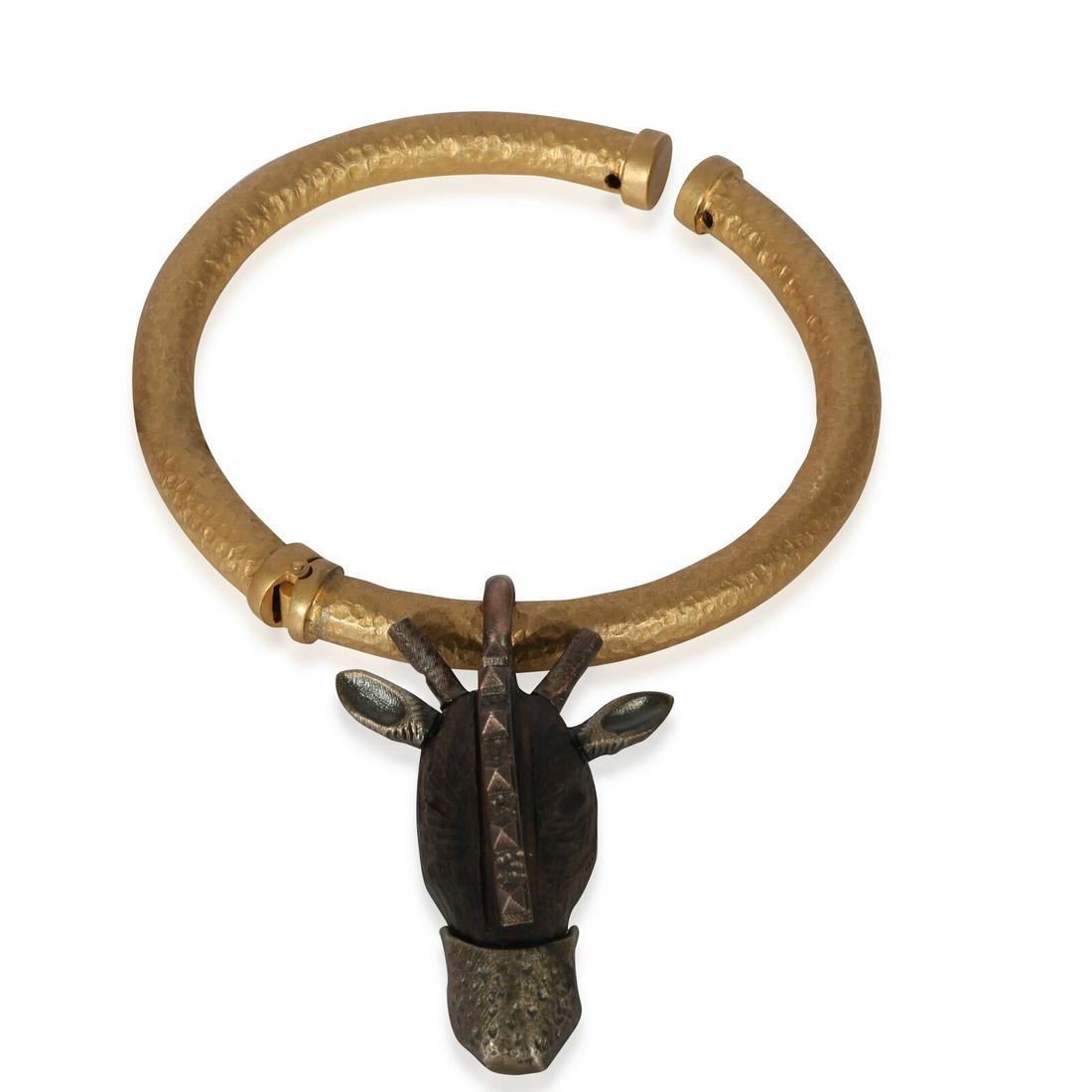 Valentino Men's Open Bangle with Tribal Mask Charm: Valentino Men's Open Bangle with Tribal Mask Charm Item Length: 8 in Original Box?: No Original Papers?: No Gross Weight (Grams): 31.45 "Product Line: Mens " Type: Fashion Bangle Includes: Pouch Style