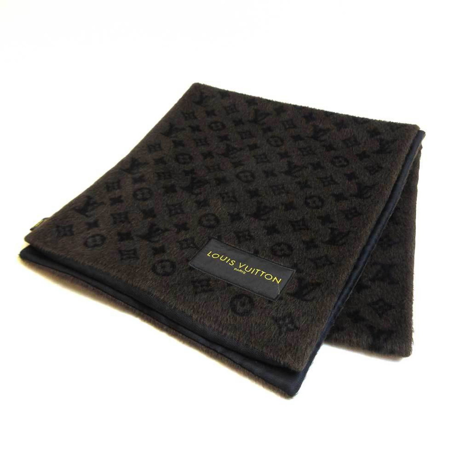 Louis Vuitton accessory monogram alpaca mixed muffler black brown: Louis Vuitton accessory monogram alpaca mixed muffler black brown Brand: Louis Vuitton Line: Monogram Color: Black Brown Material: Alpaca72% Wool28% Alpaca: 72% Wool: 28% Material (Trim): Silk100% Sil