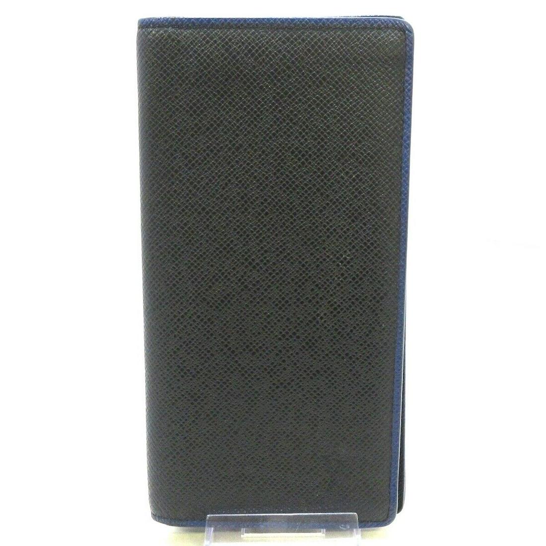 LOUIS VUITTON Portefeiulle Braza M30558 Noir Blue Taiga TA1128 Long Wallet: LOUIS VUITTON Portefeiulle Braza M30558 Noir Blue Taiga TA1128 Long Wallet Brand: LOUIS VUITTON Style: Long Wallet Color: Noir Blue Material: Taiga Leather (LV logo engraved) Model Number: M30558 Prod