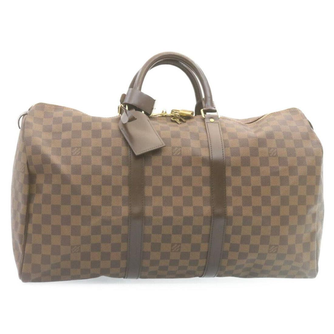 LOUIS VUITTON Damier Ebene Keepall 50 Boston Bag N41427 LV: LOUIS VUITTON Damier Ebene Keepall 50 Boston Bag N41427 LV Brand: LOUIS VUITTON Style: Boston Bag Material: Damier Ebene Canvas Exterior Color: Damie Ebene Bag Height: 9.8inch(Approx) / 25cm(Approx) B