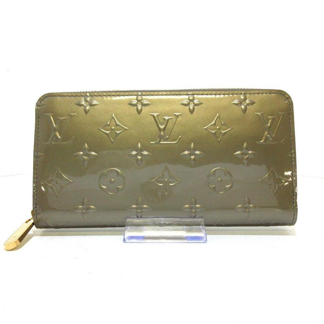 LOUIS VUITTON Zippy Wallet M68642 Champagne Metallize Gray Monogram Vernis: LOUIS VUITTON Zippy Wallet M68642 Champagne Metallize Gray Monogram Vernis Brand: LOUIS VUITTON Style: Long Wallet Color: Champagne Metallize Gray Material: Patent Leather (monogram embossed) Model Nu