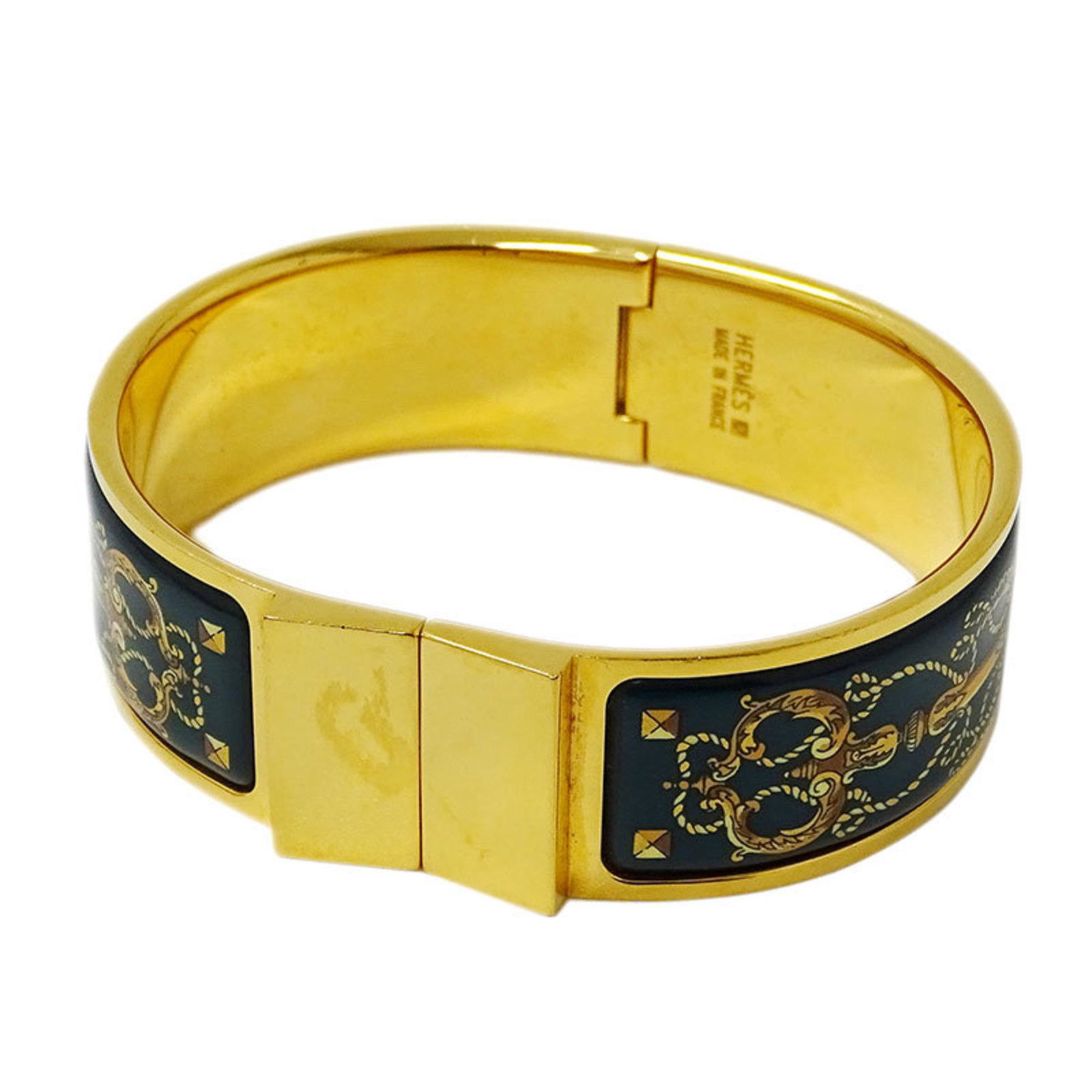Hermes HERMES Bangle Ladies Cloisonne Grilled Email Green x Gold: Hermes HERMES Bangle Ladies Cloisonne Grilled Email Green x Gold Brand: Hermes Country of Origin: France Type: Bangle Gender: Women Color: Gold Green Diameter: 6cm / 2.36 Width: 2cm / 0.78 Condition: 