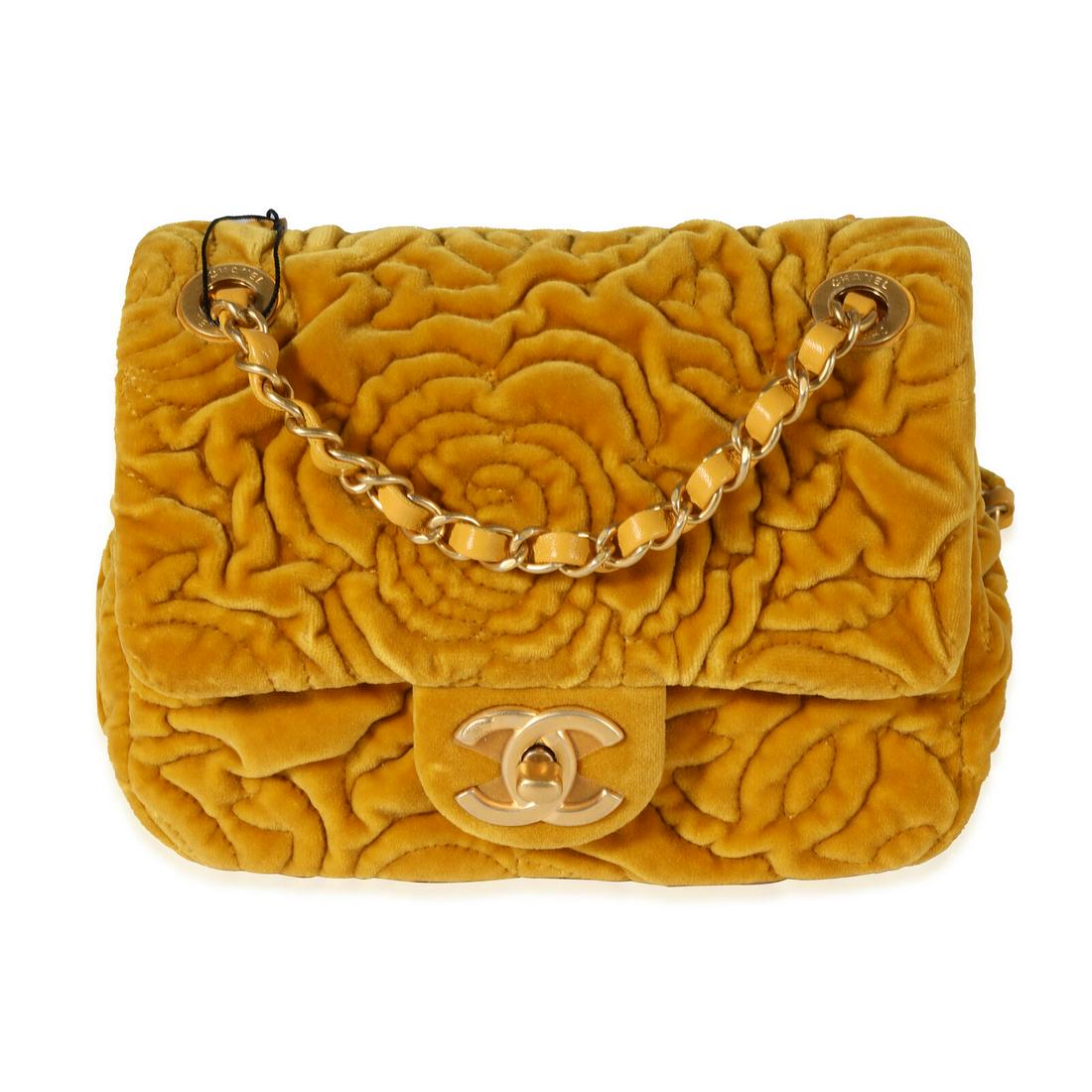 Chanel Marigold Camellia Velvet Classic Square Mini Flap Bag: Chanel Marigold Camellia Velvet Classic Square Mini Flap Bag Dimensions: 7.5 x 5.5 x 3 Handbag Accessories: Dustbag;ID Tag;Felt Protector Bag Length: 7.5 in Bag Depth: 3 in Bag Height: 5.5 in Style: C