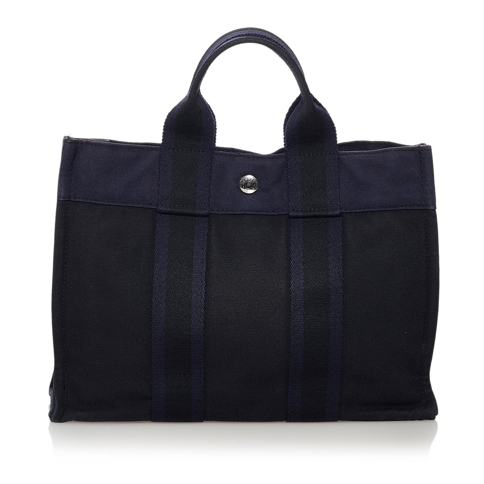 Hermes Fourre Tout PM: Hermes Fourre Tout PM The Fourre Tout PM tote features a canvas body flat straps an open top with a snap closure and an interior zip compartment. Brand: Hermes Model: Fourre Tout PM Origin: France Cat