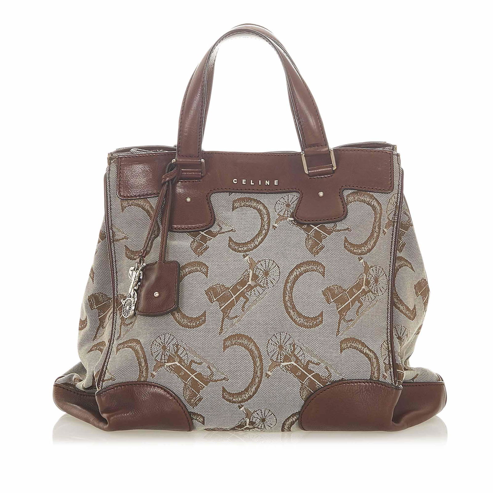 Celine C Macadam Canvas Tote Bag: Celine C Macadam Canvas Tote Bag This tote bag features a canvas body with leather trim flat leather straps an open top an interior zip compartment and interior slip pockets. Brand: Celine Model: C Ma