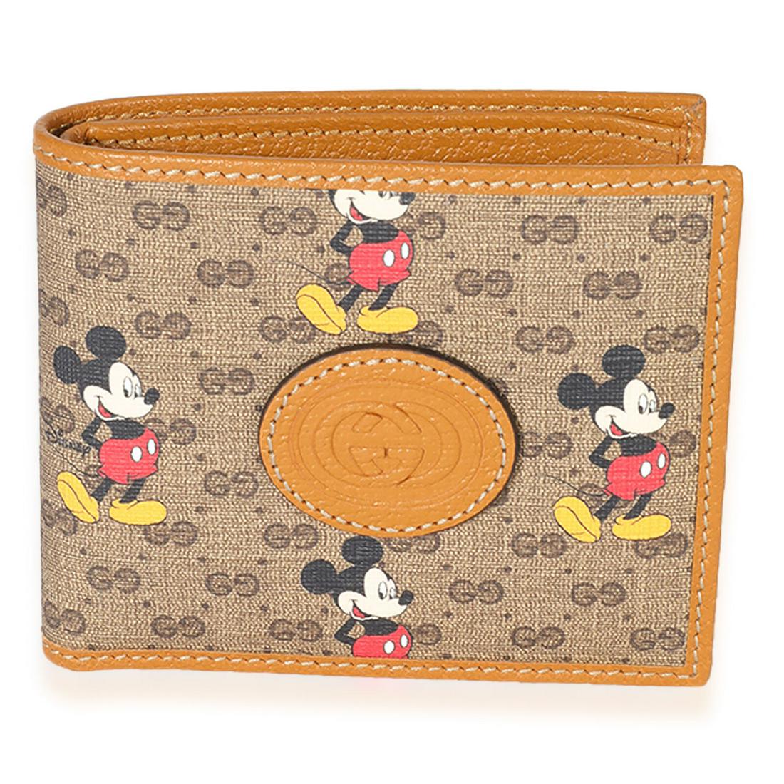 Gucci x Disney Vintage GG Supreme Mickey Mouse Bifold Wallet: Gucci x Disney Vintage GG Supreme Mickey Mouse Bifold Wallet Original Box?: No Original Papers?: No Dimensions: 4 x x 1 Handbag Accessories: Box;Dustbag Bag Length: 4 Bag Depth: 1 Style: Wallet Materi