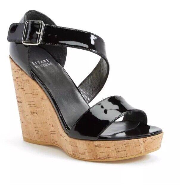 Stuart Weitzman Women's Oneliner Patent Leather Wedge Sandals N6862* Size 10 M: Stuart Weitzman Women's Oneliner Patent Leather Wedge Sandals N6862* Size 10 M Closure: Buckle Us Shoe Size: 10 Color: Black Heel Height: High (3 in. and Up) Brand: Stuart Weitzman Type: Sandal Heel S