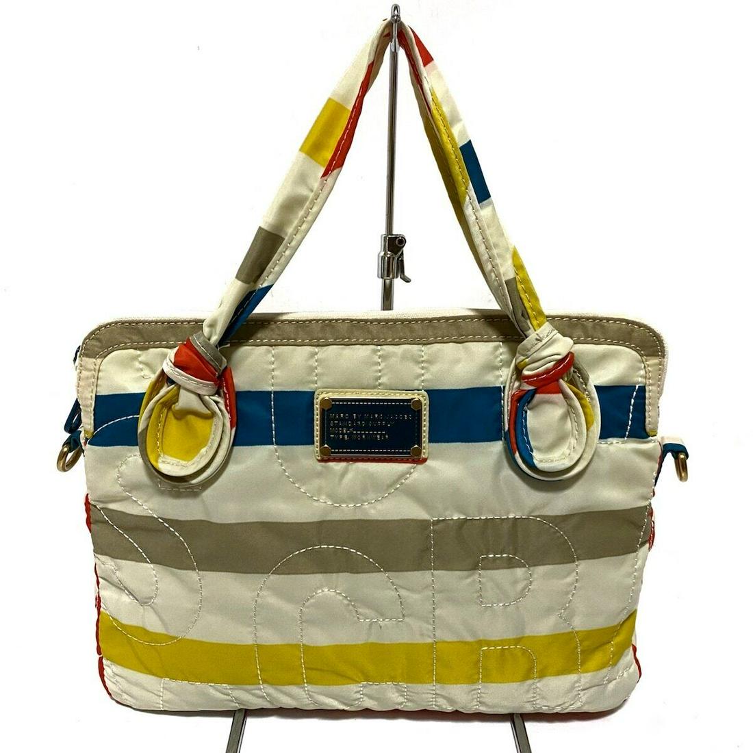 MARC BY MARC JACOBS - Cream Blue Multi Nylon Other Style Bag: MARC BY MARC JACOBS - Cream Blue Multi Nylon Other Style Bag Brand: MARC BY MARC JACOBS Style: Other Style Bag Exterior Color: Cream Blue Multi Exterior Material: Nylon Accessories: Shoulder Strap Typ