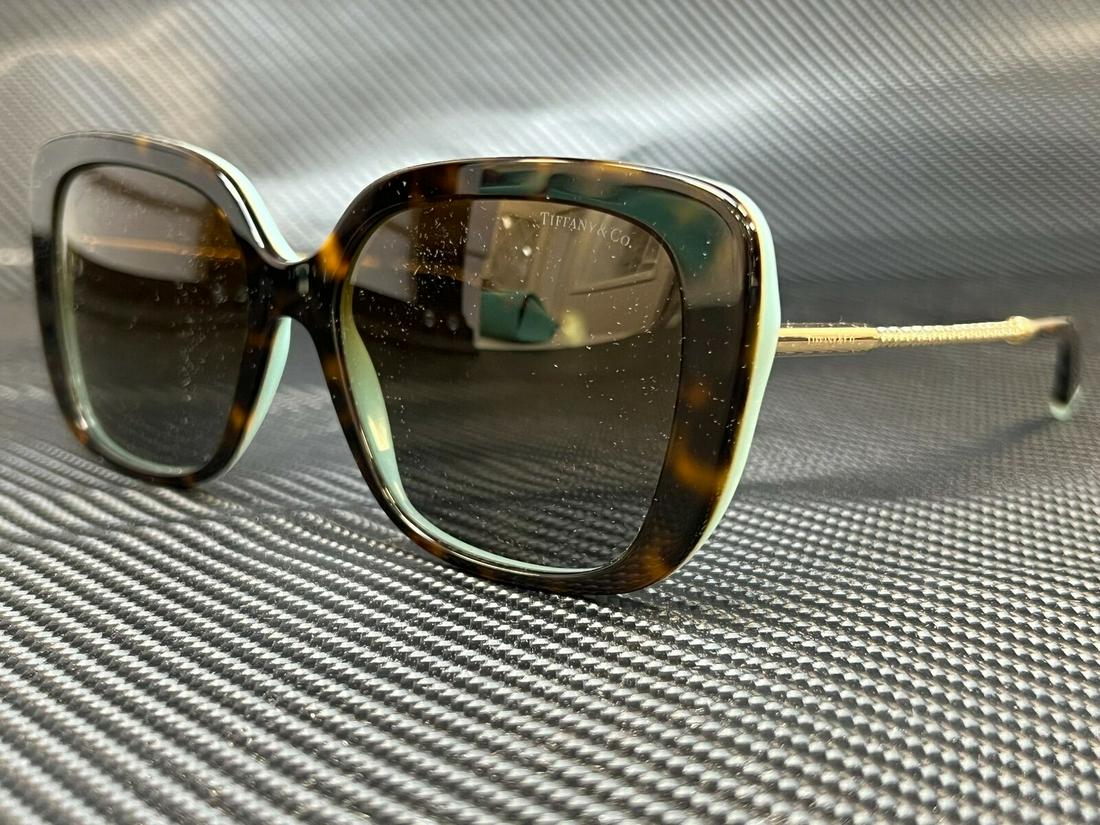 TIFFANY TF4177 8134T5 Havana Square Rectangle Women's 55 mm Polarized Sunglasses: TIFFANY TF4177 8134T5 Havana Square Rectangle Women's 55 mm Polarized Sunglasses Brand: Tiffany & Co. Type: Sunglasses Frame Color: Beige Style: Rectangle New The BIDHAUS Guarantee: All items in this 