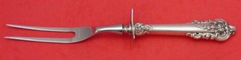 Grande Baroque by Wallace Sterling Silver Roast Carving Fork 11": Grande Baroque by Wallace Sterling Silver Roast Carving Fork 11" Grande baroque by wallace sterling silver roast carving fork 11" in the pattern grande baroque by wallace. It is not monogrammed and is