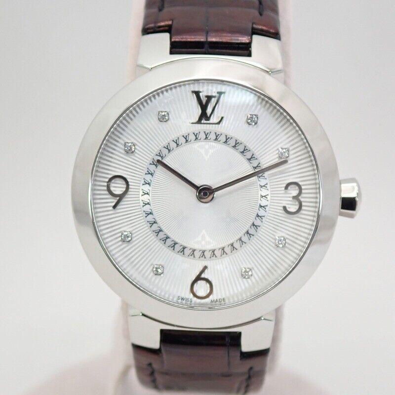 Louis Vuitton Q12MG Ladies Watch: Louis Vuitton Q12MG Ladies Watch Brand: LOUIS VUITTON Type: Watch Pre-Owned The BIDHAUS Guarantee: All items in this auction are guaranteed to be 100% authentic. At Your Service: At BIDHAUS, our Custo