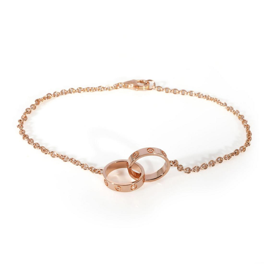 Cartier Love Bracelet in 18k Rose Gold: Cartier Love Bracelet in 18k Rose Gold Item Length: 7 in Original Box?: Yes Original Papers?: Yes Metal Purity: 18k Gross Weight (Grams): 3.85 Product Line: Love Type: Bracelet Includes: Box;Pouch;Cer