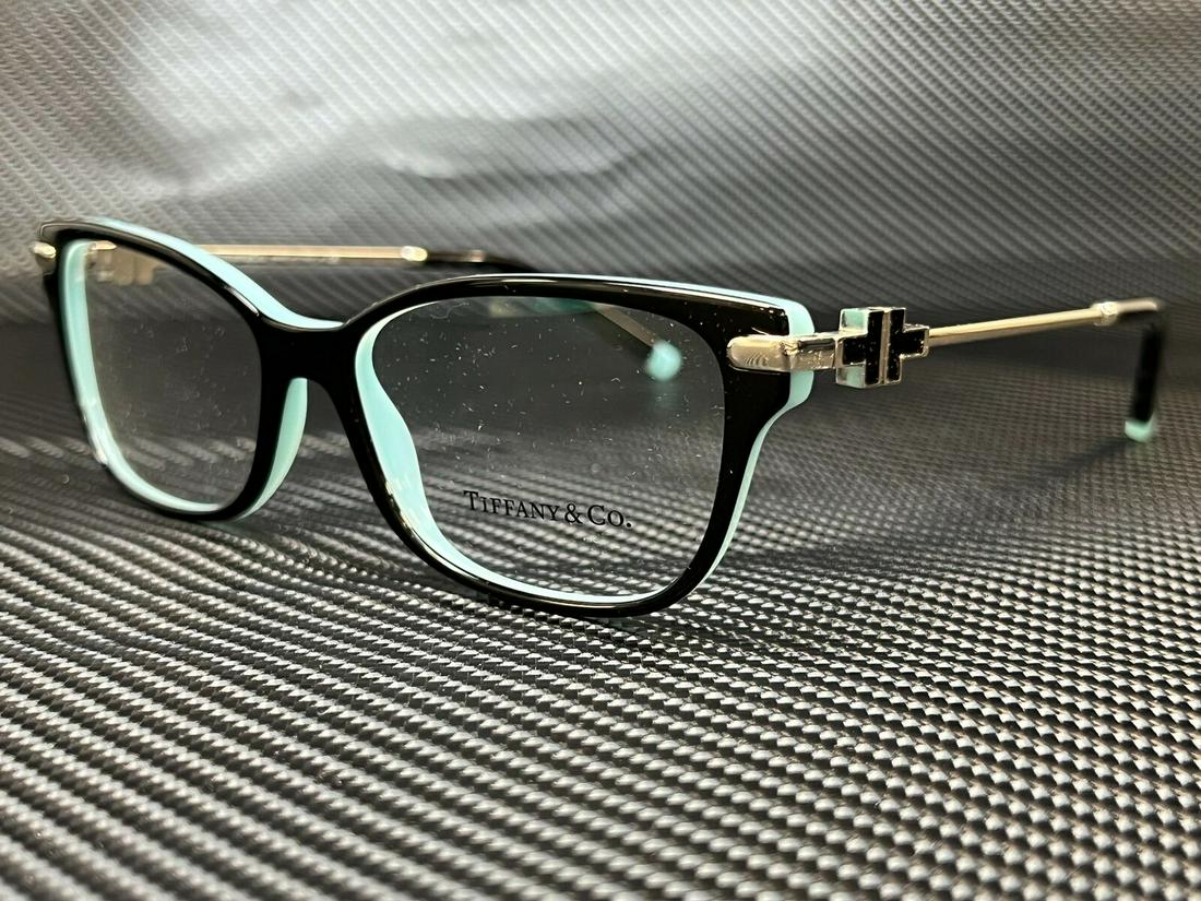 TIFFANY TF2207 8055 Black On Tiffany Rectangle Women's 52 mm Eyeglasses: TIFFANY TF2207 8055 Black On Tiffany Rectangle Women's 52 mm Eyeglasses Brand: Tiffany & Co. Frame Color: Black Type: Eyeglasses Style: Rectangle New The BIDHAUS Guarantee: All items in this auction a