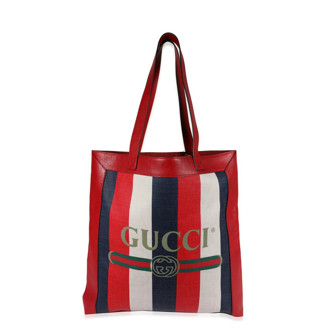 Gucci Red White & Blue Logo Stripe Canvas and Leather Tote: Gucci Red White & Blue Logo Stripe Canvas and Leather Tote Dimensions: 18 x 17.5 x 2 Handbag Accessories: Dustbag;Care Booklet;Retail Tag Bag Length: 18 in Bag Depth: 2 in Bag Height: 17.5 in Style: S